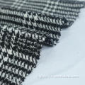 Tessuto in tweed a quadri di miscela di lana in poliestere